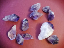 Load image into Gallery viewer, Amethyst points small 30g in organza bag.
